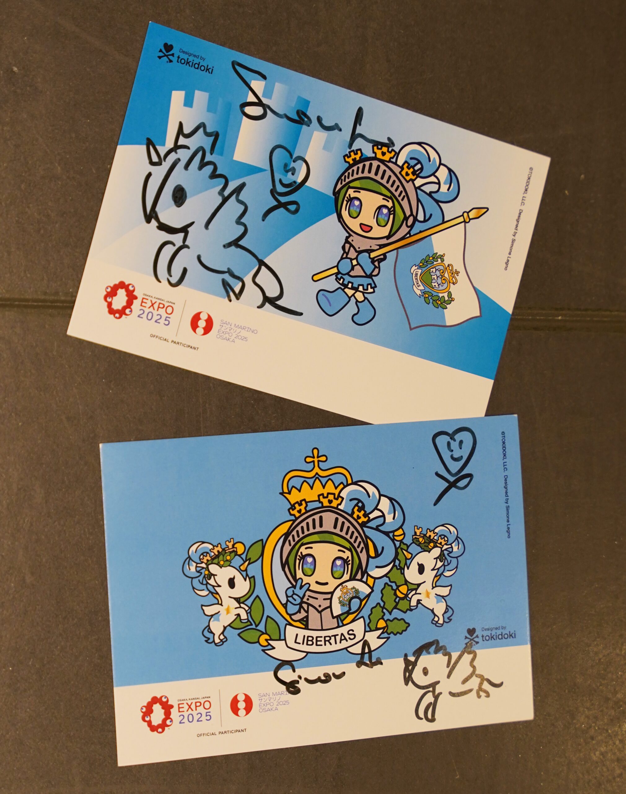 サインの入ったリベルタスのピストカード